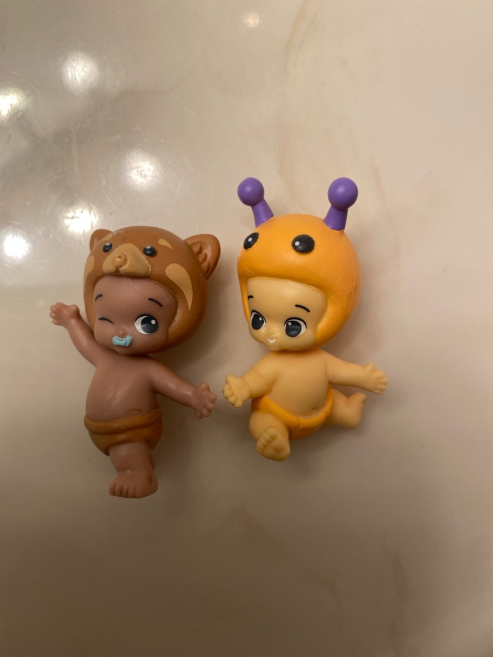 (2) Twozies Babies, Brown Bear & Orange Beetle